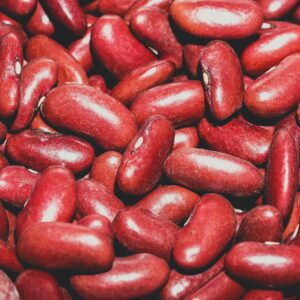 A vibrant close-up of fresh red kidney beans showcasing texture and color.